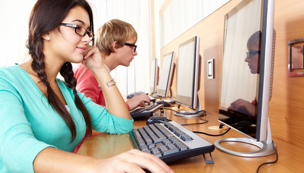 students using computers to look at data collected with a "make it personal" mindset